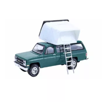   Greenlight - 1:64 1990 Chevrolet Suburban - Green with Modern Rooftop Camper  - The Great Outdoors Series 4