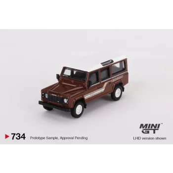   Minigt - 1:64 Land Rover Defender 110 County Station Wagon Russet Brown 1985 (LHD) - MINI GT